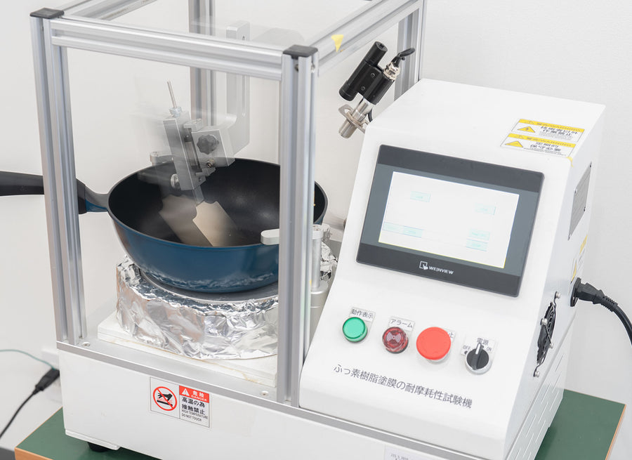 ふっ素樹脂塗膜耐摩耗試験機